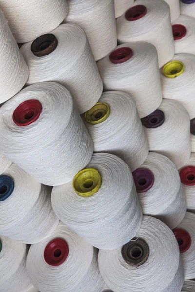 Cotton reels stacked together — Stock Photo, Image