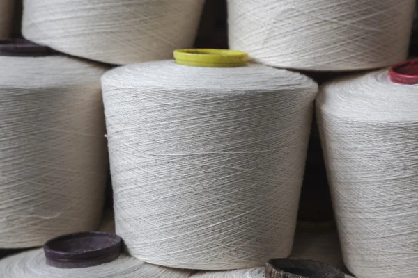 Cotton reels stacked together — Stock Photo, Image