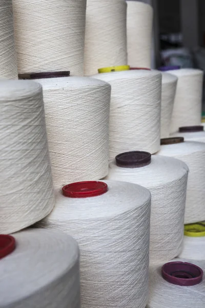 Cotton reels stacked together — Stock Photo, Image