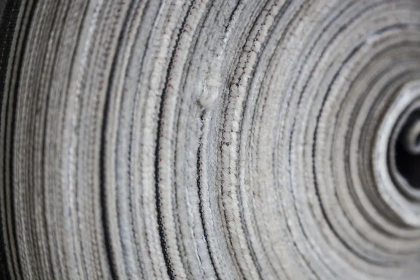 Cortinas enroladas em uma fábrica de jeans — Fotografia de Stock