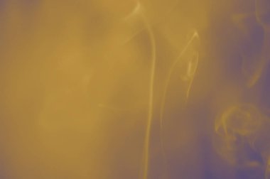 Değişik şekillerde yüzen dumanın bulanık arkaplanı.