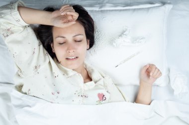 Ill Woman in Bed