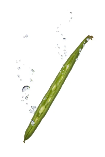 Green bean in water with air bubbles — Stock Photo, Image