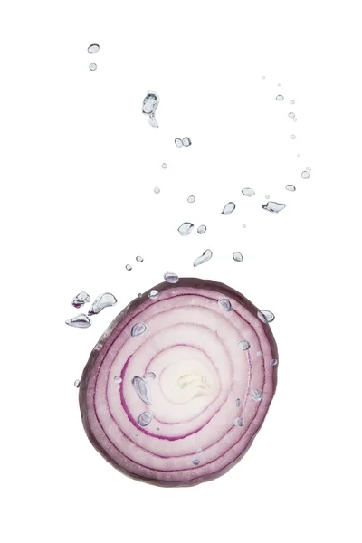 Onion in water with air bubbles — Stock Photo, Image