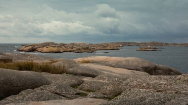 Coast of the archipelago in Smoegen on the west coast of Sweden on an overcast cloudy day