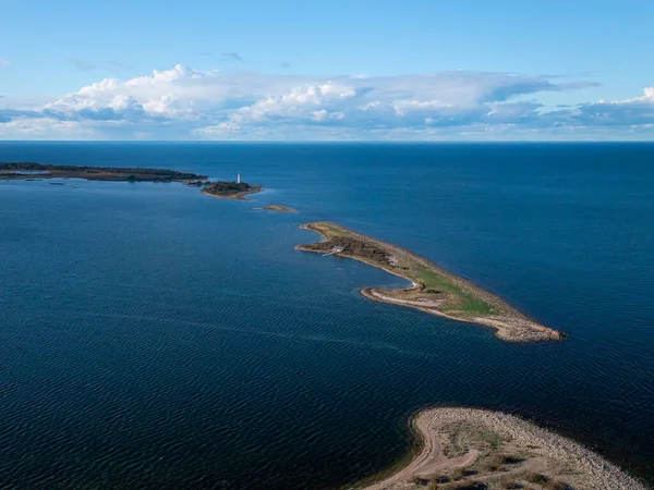 Coast and lighthouse Lange Erik on north coast of the island of Oland in the east of Sweden from above in the sun