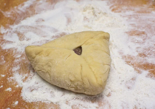 Cooking pies with meat and cheese — Stock Photo, Image