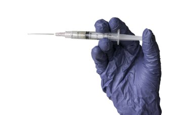 A hand wearing a blue glove holding a syringe isolated on a white background.