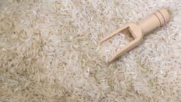 Small Scoop Rice Background — стоковое фото