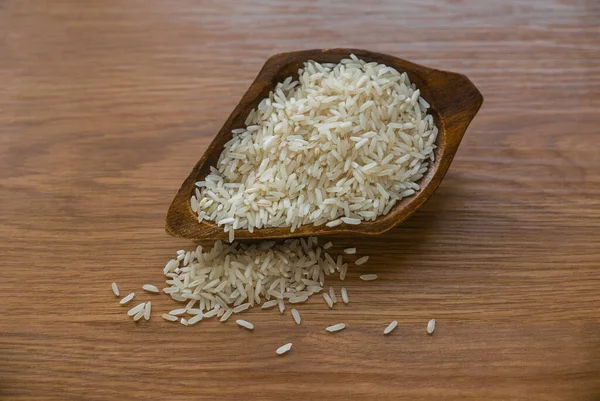 Selective Focus Rice Wooden Background — стоковое фото