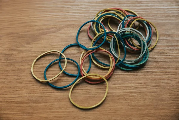 Colourful Multi Coloured Elastic Rubber Bands Wooden Background — Fotografia de Stock