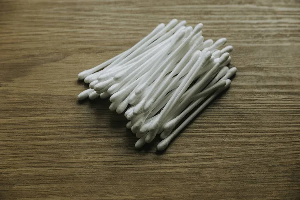 White Cotton Buds Isolated Wooden Background — Stock fotografie