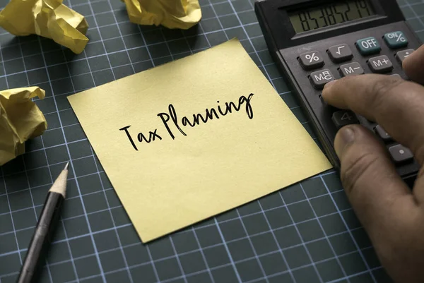 Hand Pressing Calculator Yellow Memo Paper Note Written Tax Planning — Foto de Stock