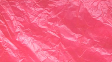 Kırmızı ve buruşuk plastik torba arka plan ve doku.