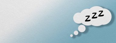Sleep and rest concept with bubble cloud icon on blue background with copy space.