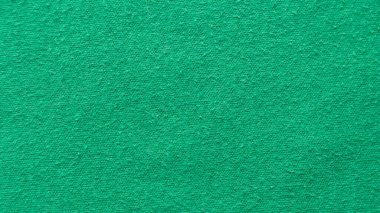 Tekstil ve doku şablonu. Yeşil pamuk kumaş. Arka plan..