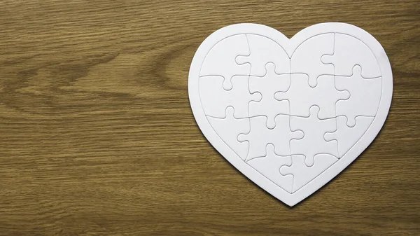 Top View Heart Love Shape Jigsaw Puzzle Wooden Background — Stockfoto