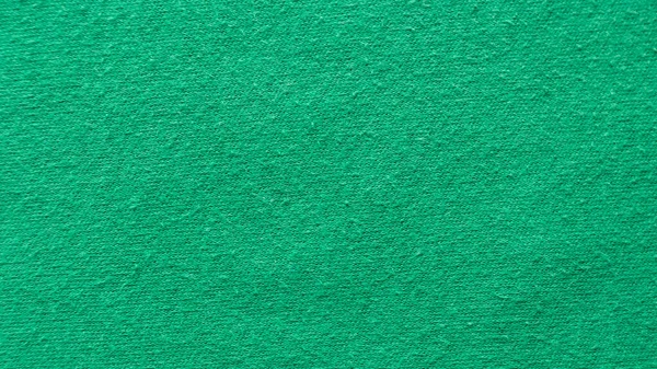 Tekstil ve doku şablonu. Yeşil pamuk kumaş. Arka plan..