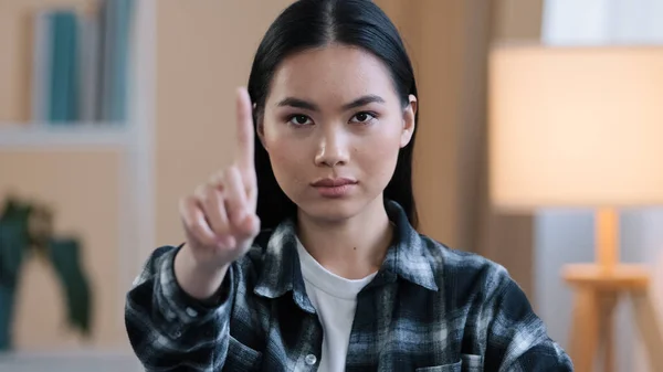 Asian girl portrait woman serious angry aggressive lady waving index finger negative no answer not sign ban forbiddance prohibition disagreement misunderstanding defense refusal failure rejection — Stock Photo, Image
