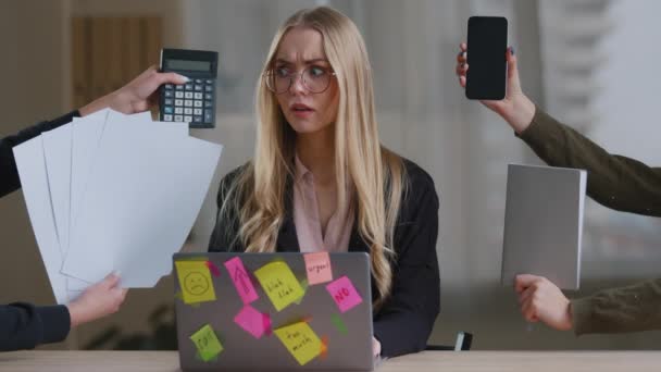 Multitasking business woman manager in office sitting at table have many tasks work feeling stress overworked exhausted from hands with calculator notebook papers phone tired girl in glasses headache — Stock Video