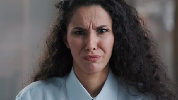 Dissatisfied young confused business woman female employee arabian girl feeling aversion make frowning face squinting wrinkle nose demonstrate discontent grimacing look at disgusting unpleasant thing — стоковое видео