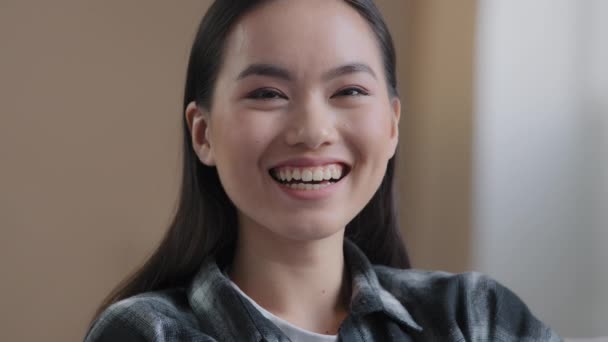 Extreme close-up Asian girl portrait woman with perfect white toothy smile looking at camera laughing at funny joke humorous silly situation lady enjoying good mood enthusiastically laugh having fun — Stock Video