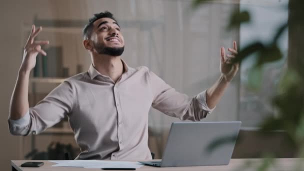 Amazed happy businessman hispanic guy worker winner dance at office emotional young man feel euphoric have fun celebrate monetary victory promotion salary growth get lot of money cash usd banknotes — Stock Video