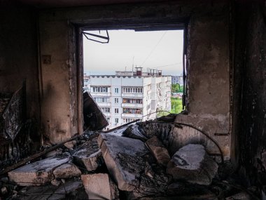Kharkiv, Kharkov, Ukraine - 05.07.2022: inside view from destroyed apartment broken room after missile strike shelling by Russian army air attack on civilian house building war in Ukrainian city