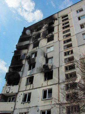 Kharkiv, Kharkov, Ukraine - 05.07.2022: burnt destroyed after fire bombing civilian building apartment result rocket strike shelling military demanded russian terrorists Ukrainian people genocide war