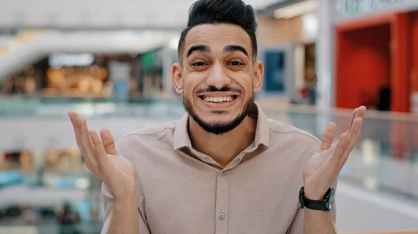 Happy emotional enthusiastic surprised shocked amazed indian hispanic arabian man manager male guy looking at camera opens mouth in surprise delight winning victory luck success business offer win — Stockfoto