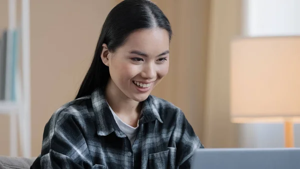 Headshot asian girl student freelancer business woman typing on laptop computer working in internet female professional lady using pc technology at home smiling happy doing online job browsing web — Stock Photo, Image