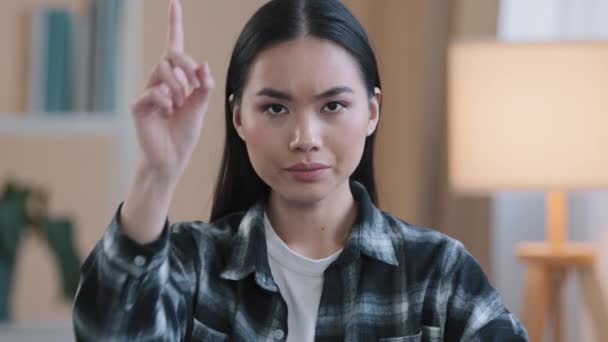 Asian girl portrait woman serious angry aggressive lady waving index finger negative no answer not sign ban forbiddance prohibition disagreement misunderstanding defense refusal failure rejection — Stock Video