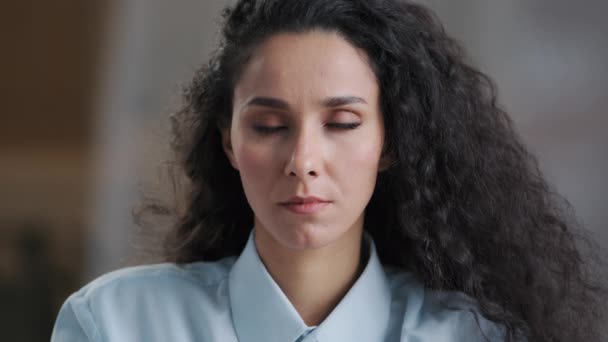 Portrait female upset face arab girl attractive hispanic woman with curly hair natural makeup sad model student serious offended frustrated facial expression look at camera posing in office workplace — Stock Video