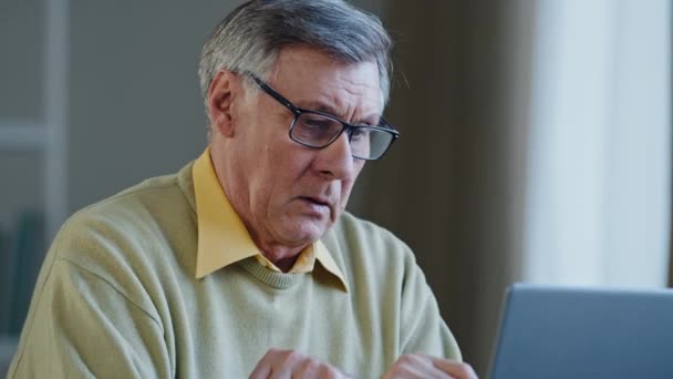 Close Tired Caucasian Man Indoor Working Laptop Elderly 60S Male — Stock Video