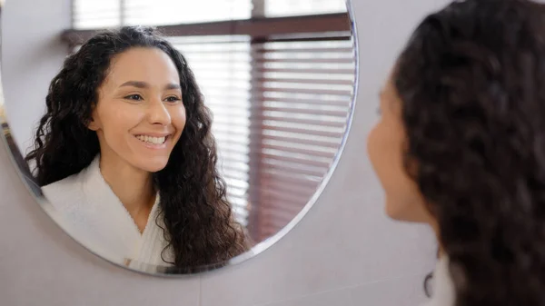 Young Calm Attractive Woman Bathrobe Stands Bathroom Looks Mirror Admiring — Stock Photo, Image