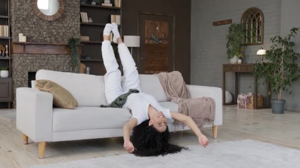 Young Crazy Funny Carefree Woman Lying Upside Cozy Sofa Living — Video Stock