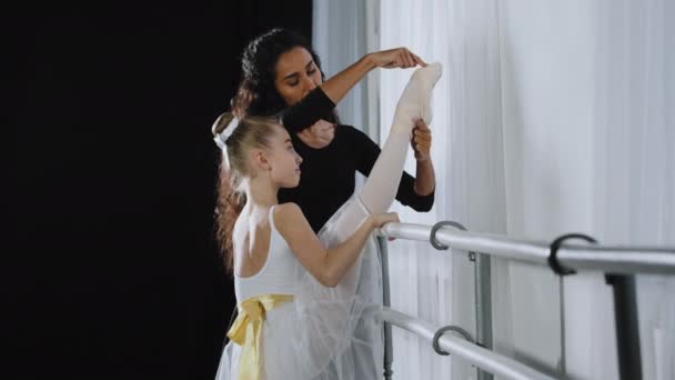 Teen Flexible Girl Kid Child Ballerina White Tutu Stretching Leg — Video
