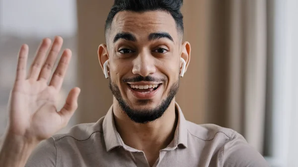 Happy Young Coach Arab Man Blogger Wears Wireless Earphones Say — Stok fotoğraf