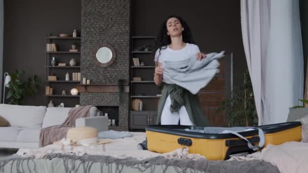 Young Funny Happy Woman Folds Clothes Packs Suitcase Going Journey — Stockvideo