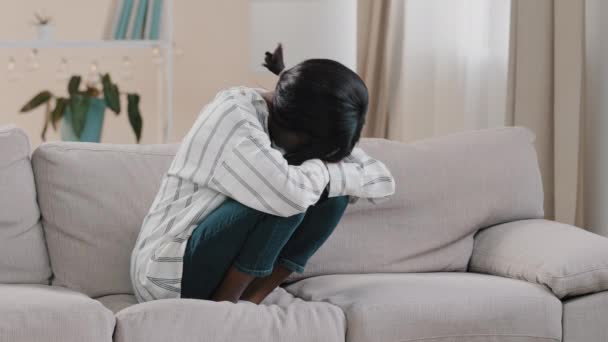 Young Tense Depressed Sad Woman Sitting Sofa Hugging Knees Thinking — Vídeo de stock