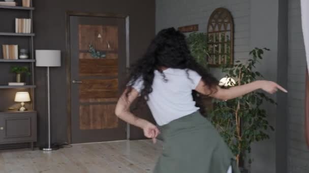 View Back Young Excited Woman Dancing Dynamic Modern Living Room — Video
