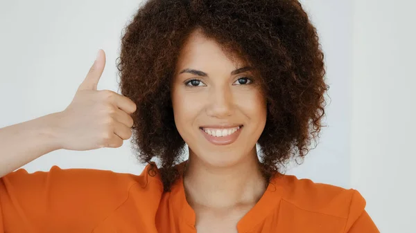 Smiling Cheerful African American Happy Woman Curly Hairstyle Showing Thumb — Stockfoto