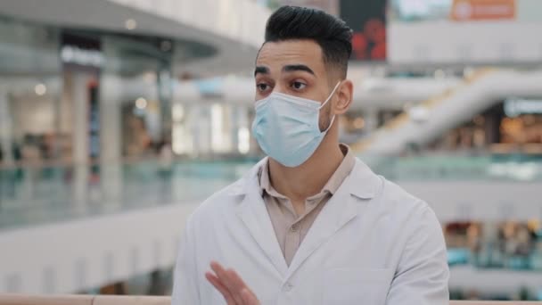 Spanish Arabic Indian Medical Worker Man Doctor Mask Uniform Measures — Vídeos de Stock