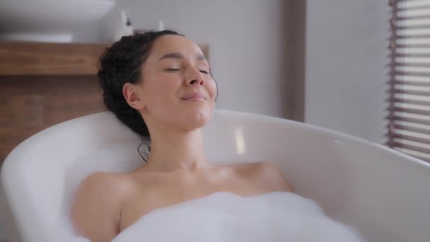 Calm Relaxed Woman Lies Foam Bath Eyes Closed Enjoying Relaxing — Vídeo de Stock
