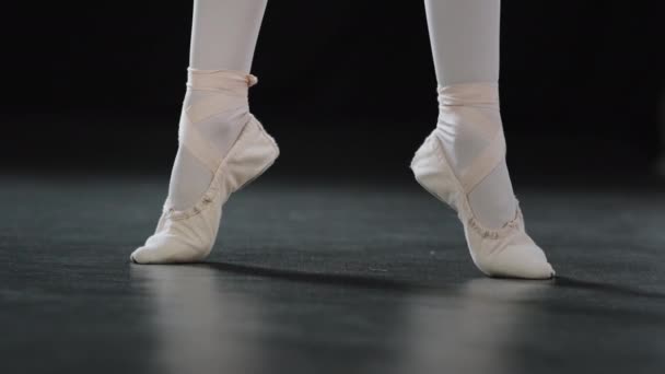 Close Female Foot Pointe Shoes Tying Laces Rise Standing Floor — 图库视频影像