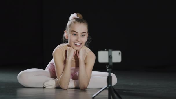 Slow Motion Teen Girl Ballerina Child Teenager Gymnast Dancer Sitting — Stockvideo
