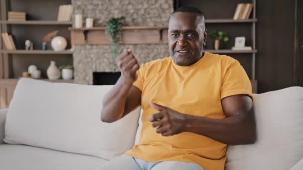 Mature Aged African American Man Mentor Coach Sits Living Room — Vídeos de Stock