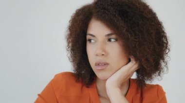 Sad worried African woman ponder thinking problem feeling anxiety depression upset frustrated lonely curly haired pensive girl lady grief troubled think thoughtful sad offended female portrait closeup