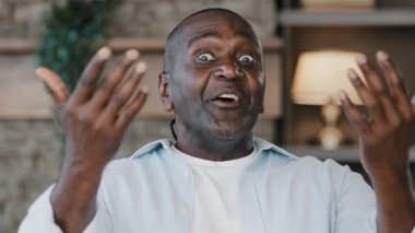 African american hospitable generous man friendly american mature adult friendly homeowner businessman make welcoming gesture both hands inviting to come here asking go closer invitation welcome sign