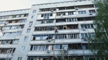 Kharkiv, Kharkov, Ukraine - 05.07.2022: Broken windows empty balconies frames with crush glass after explosion of rocket bomb shelling war destruction russian terrorism attacks war horror destroy